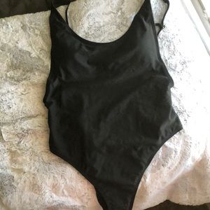 Black one piece, cheeky, sleek, elegant, unworn